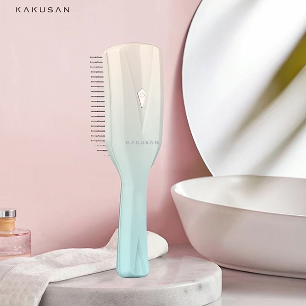 Lược massage chống rụng tóc bằng ánh sáng Kakusan KKS-203